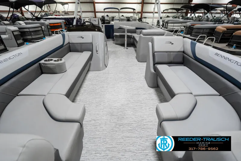 Slide: The Image of 2025 Bennington 22 SXL pontoon boat interior with spacious seating and modern design. - 16