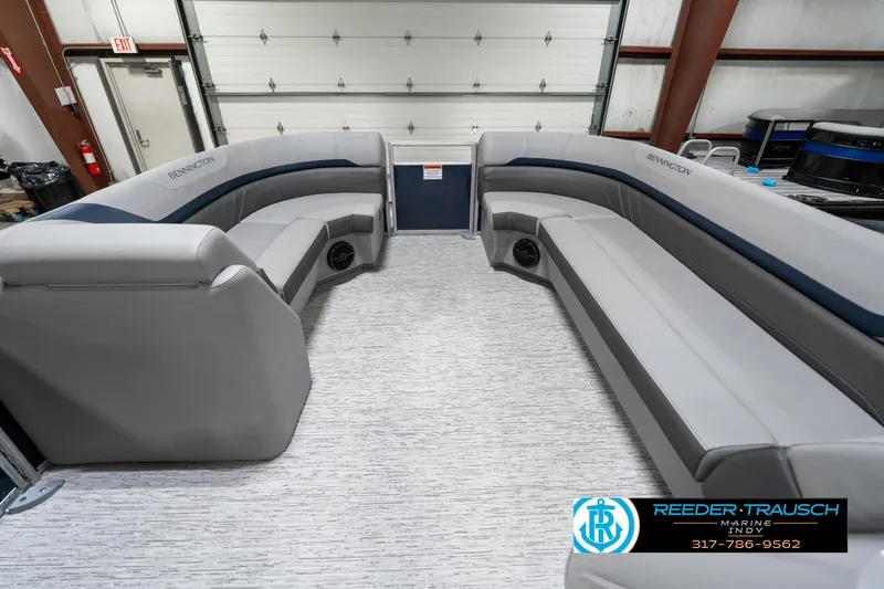 Slide: The Image of 2025 Bennington 22 SXL pontoon boat interior with spacious seating and modern design. - 22