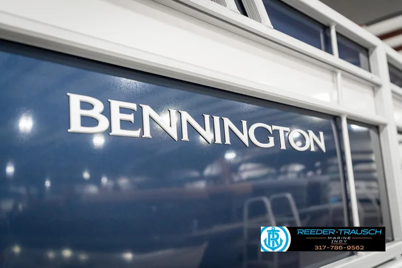 Slide: The Image of 2025 Bennington 22 SXL boat with logo, showcased at Reeder-Trausch Marine. - 49