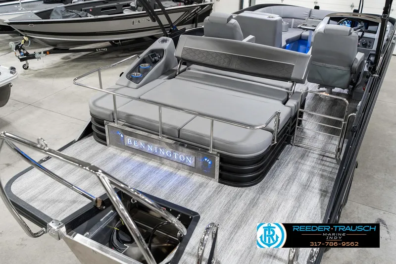Slide: The Image of 2025 Bennington 23 LTSB pontoon boat with sleek gray seating and modern design. - 14