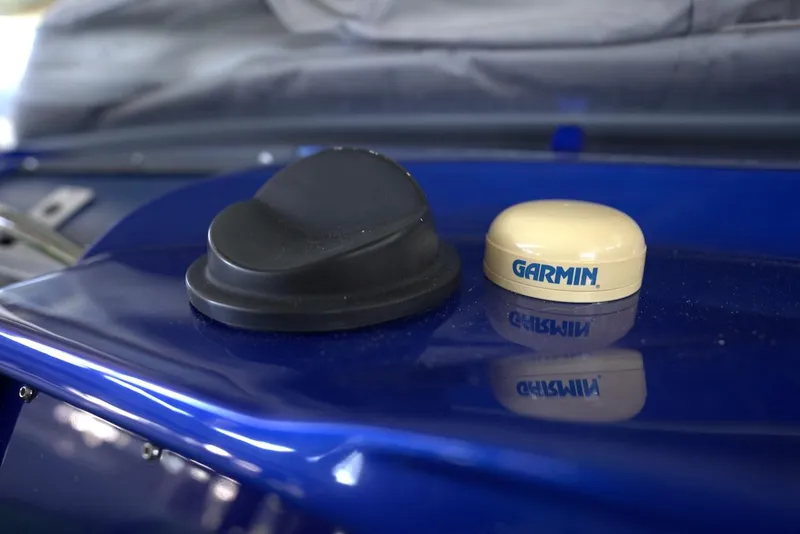 Slide: The Image of Two GPS antennas on a blue 2008 Outerlimits 39 Quattro boat. - 29