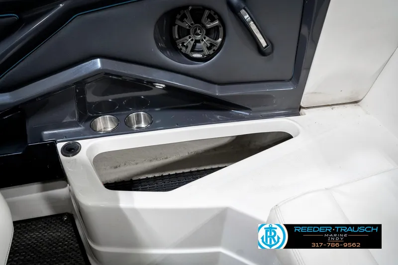 Slide: The Image of Interior of 2013 Monterey 232 SS boat with cup holders and speaker. - 30