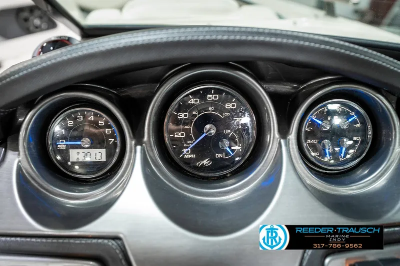 Slide: The Image of Dashboard of a 2013 Monterey 232 SS boat with speedometer and gauges. - 41