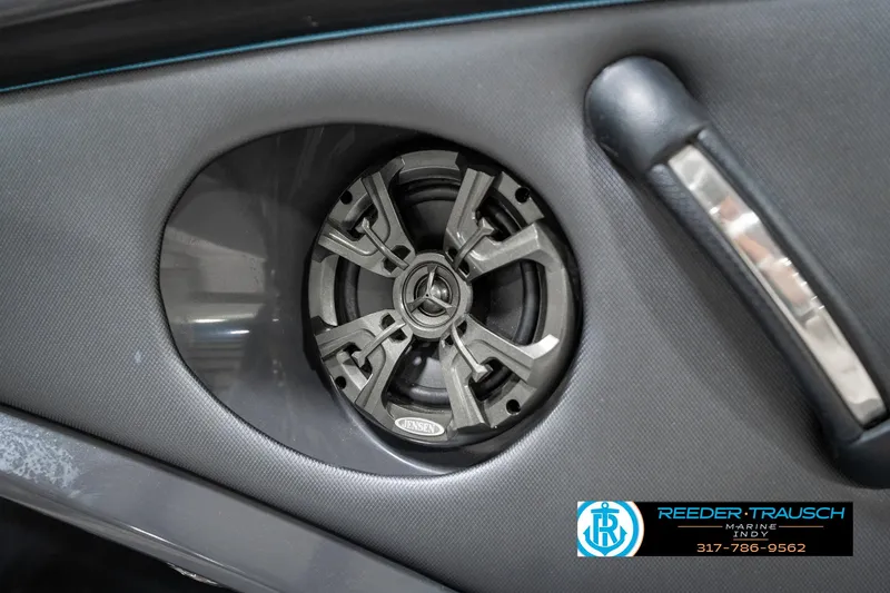 Slide: The Image of Speaker system in 2013 Monterey 232 SS boat interior, featuring sleek design and branding. - 47