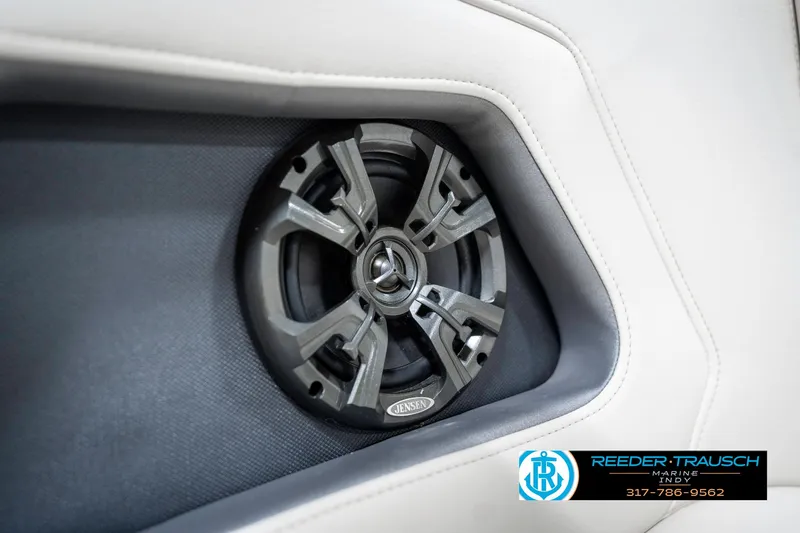 Slide: The Image of Speaker detail in 2013 Monterey 232 SS boat interior, featuring sleek design and branding. - 48