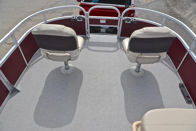 Slide: The Image of 2018 Sun Tracker Bass Buggy 18 DLX pontoon boat with two swivel seats. - 22
