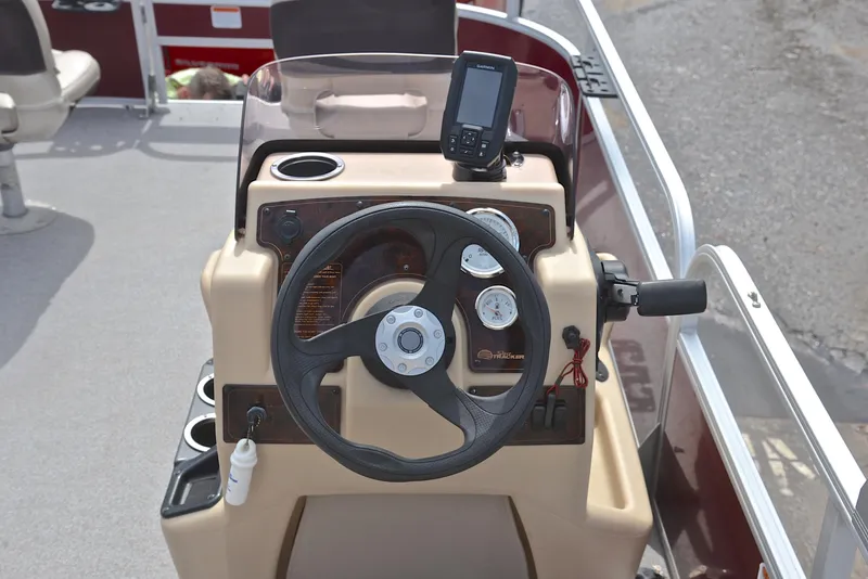 Slide: The Image of 2018 Sun Tracker Bass Buggy 18 DLX steering console with gauges and fish finder. - 27