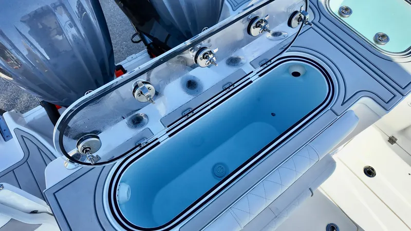 Slide: The Image of Livewell on 2025 Sea Fox 288 Commander boat, featuring sleek design and functionality. - 12