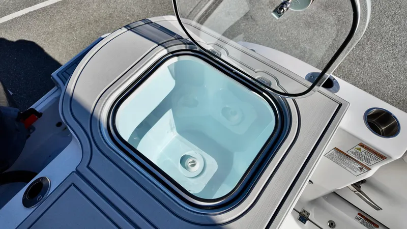Slide: The Image of Open storage compartment on 2025 Sea Fox 288 Commander boat. - 13
