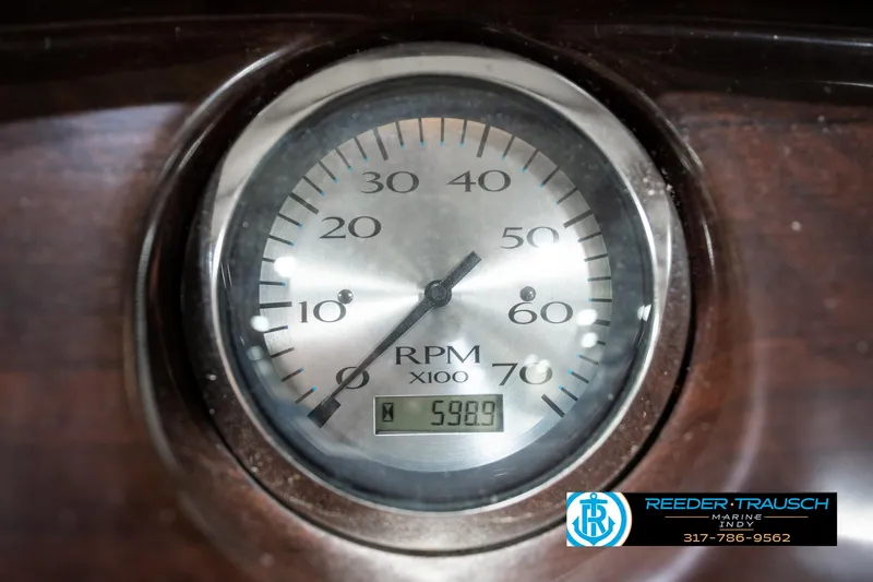 Slide: The Image of RPM gauge of a 2011 Bennington 20 SFI boat, displaying 5989 hours. - 37