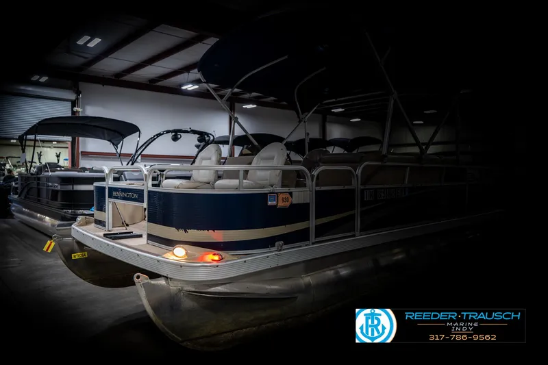Slide: The Image of 2011 Bennington 20 SFI pontoon boat in indoor storage facility. - 4