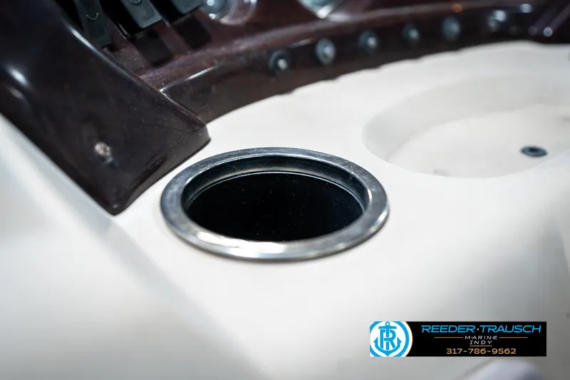 Slide: The Image of Cup holder on 2011 Bennington 20 SFI boat dashboard, close-up view. - 42