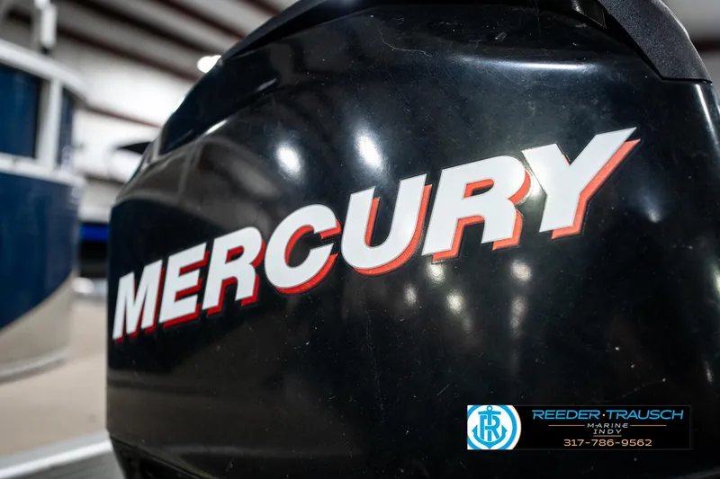 Slide: The Image of Mercury engine on a 2011 Bennington 20 SFI boat, close-up view. - 45
