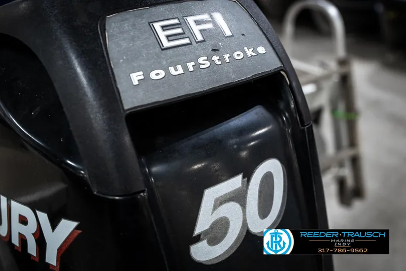 Slide: The Image of EFI FourStroke 50 engine on a 2011 Bennington 20 SFI boat. - 46
