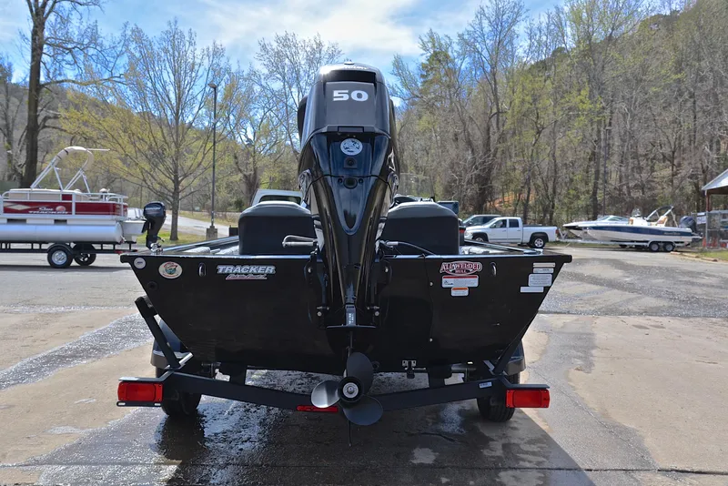Slide: The Image of 2023 Bass Tracker Pro 170 boat, rear view, parked on a trailer. - 13