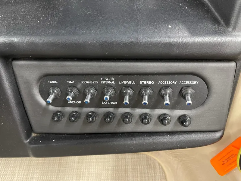 Slide: The Image of Control panel of a 2021 Bentley Pontoons Legacy 200 Cruise RE boat. - 13