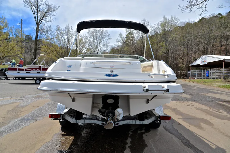 Slide: The Image of 2004 Chaparral 220 SSi boat on trailer, rear view, outdoors. - 13