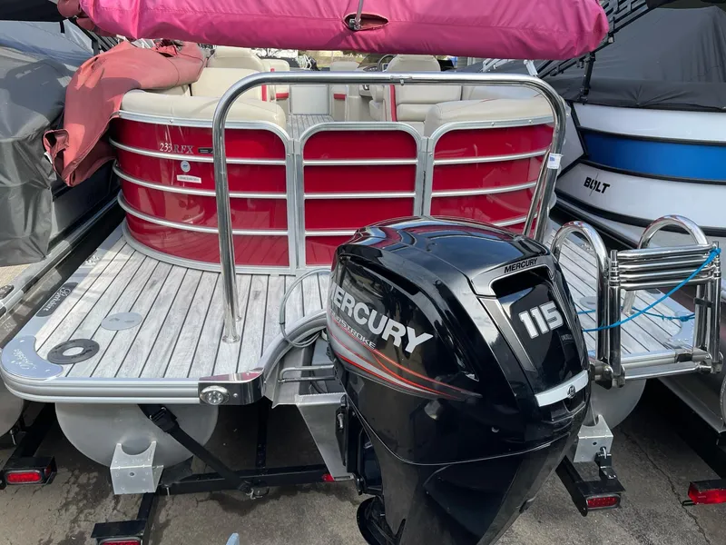 Slide: The Image of 2016 Berkshire 233RFX STS pontoon boat with Mercury 115 outboard motor. - 4