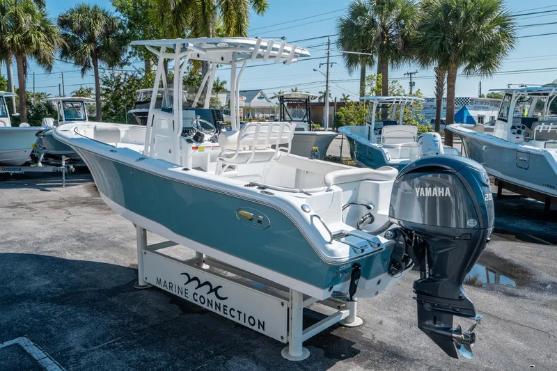 Slide: The Image of 2025 Sea Hunt Ultra 229 boat with Yamaha engine displayed at Marine Connection. - 4