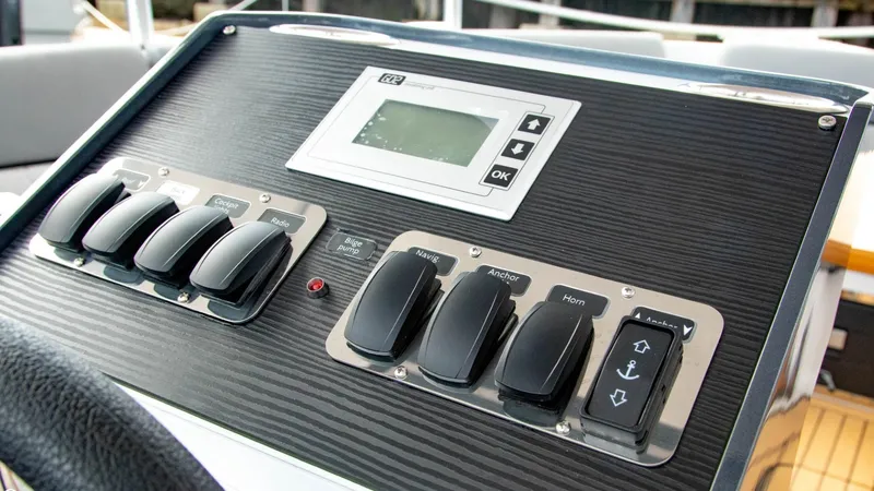 Slide: The Image of Control panel of 2023 Alfastreet 21 Open boat with switches and display. - 14