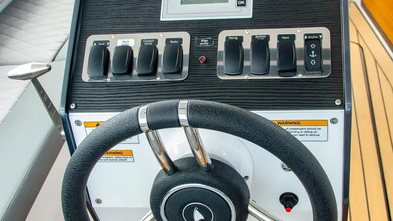 Slide: The Image of Steering wheel and control panel of 2023 Alfastreet 21 Open boat. - 15