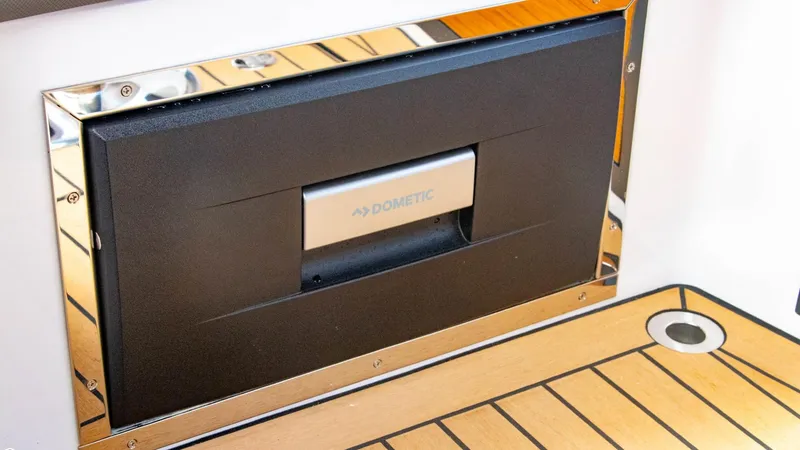 Slide: The Image of 2023 Alfastreet 21 Open boat interior with Dometic appliance. - 24