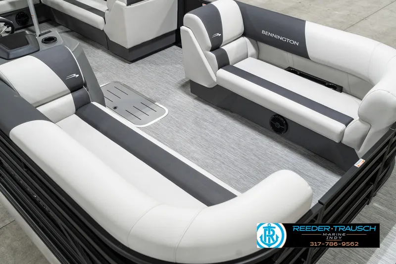 Slide: The Image of 2025 Bennington 21 SL pontoon boat interior with gray and white seating. - 13