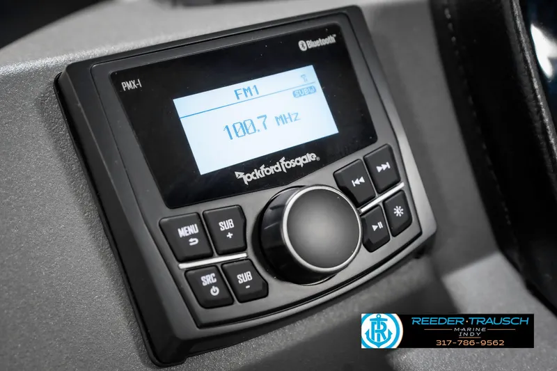 Slide: The Image of Radio system in 2025 Bennington 21 SL boat, displaying FM 100.7 MHz. - 34