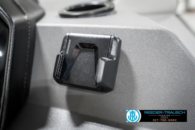 Slide: The Image of 2025 Bennington 21 SL interior detail with cup holder and accessory mount. - 36