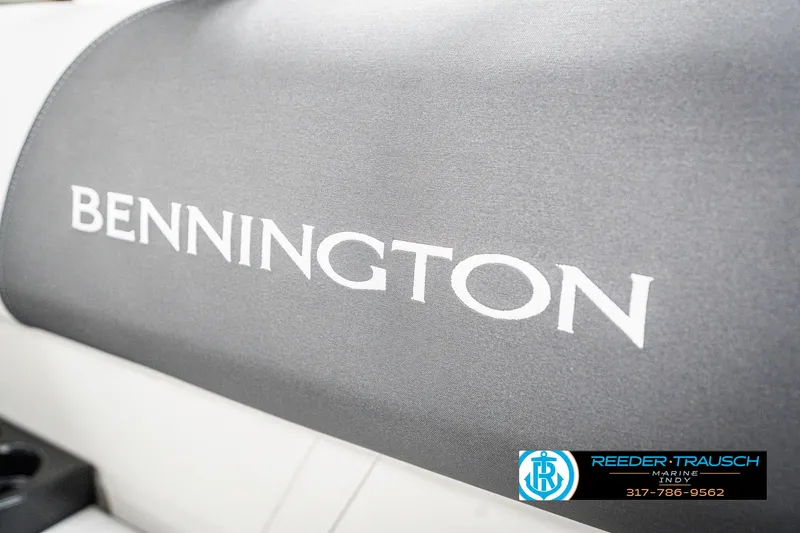Slide: The Image of 2025 Bennington 21 SL boat seat with logo, featuring Reeder-Trausch Marine branding. - 42
