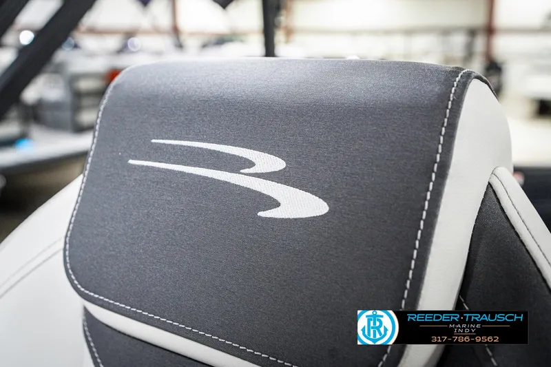 Slide: The Image of 2025 Bennington 21 SL boat seat with logo, featuring sleek design and stitching. - 43