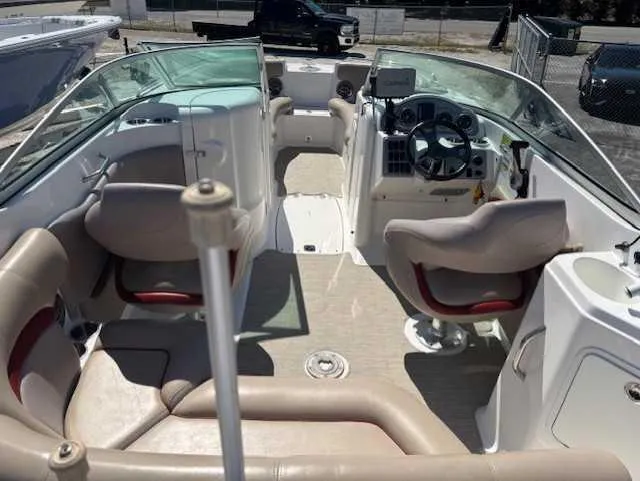 Slide: The Image of 2015 Hurricane SD 2200 DC OB boat interior with seating and steering console. - 12