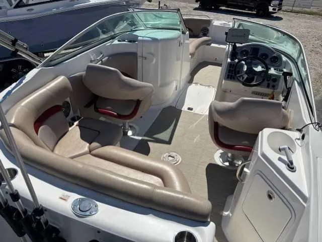 Slide: The Image of 2015 Hurricane SD 2200 DC OB boat interior with seating and steering console. - 13