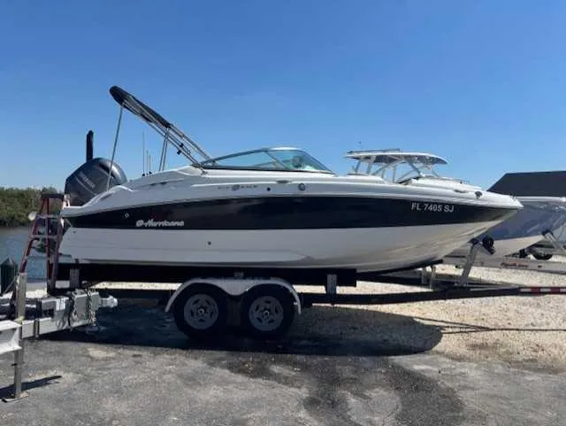 Slide: The Image of 2015 Hurricane SD 2200 DC OB boat on trailer, parked outdoors. - 3