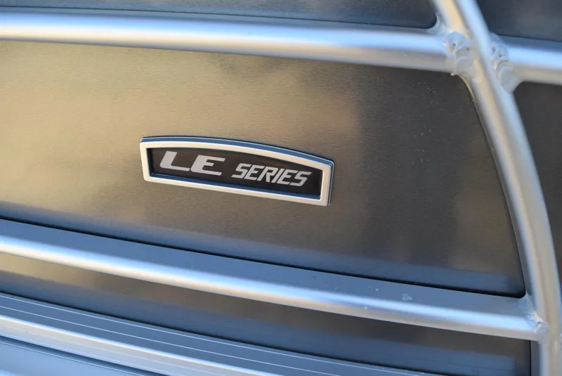 Slide: The Image of Trifecta 22RF LE 2.75 2023 model, LE Series emblem on metallic surface. - 4