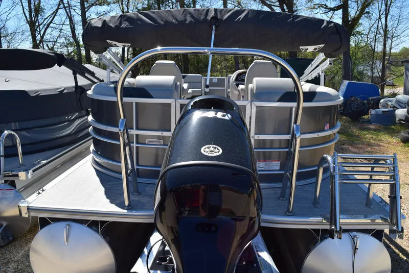 Slide: The Image of 2023 Trifecta 22RF LE 2.75 pontoon boat with outboard motor, rear view. - 6