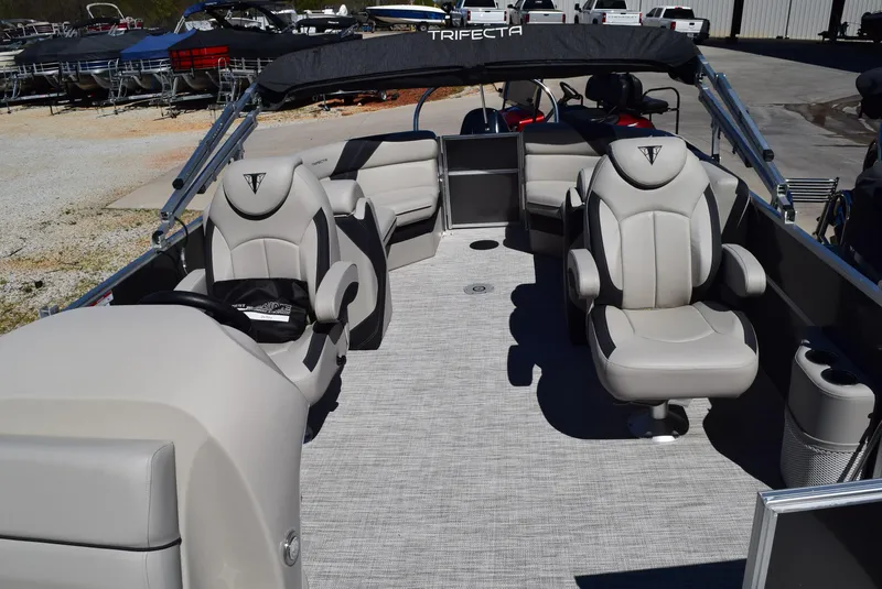 Slide: The Image of 2023 Trifecta 22RF LE 2.75 pontoon boat interior with luxurious seating and modern design. - 8