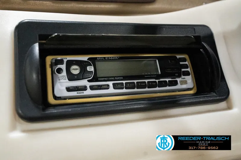 Slide: The Image of 2001 Sweetwater SW 20 RE boat stereo system, Millennium brand, with CD player and radio controls. - 27