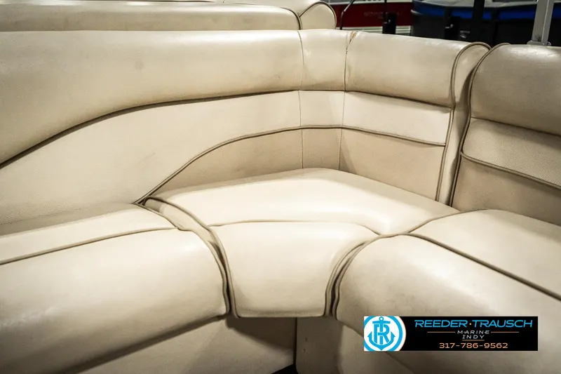 Slide: The Image of 2001 Sweetwater SW 20 RE boat seating, beige upholstery, corner view. - 32