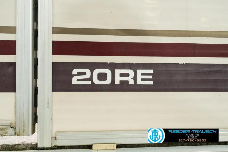 Slide: The Image of Sweetwater SW 20 RE 2001 model with maroon and beige stripes, Reeder-Trausch logo visible. - 41
