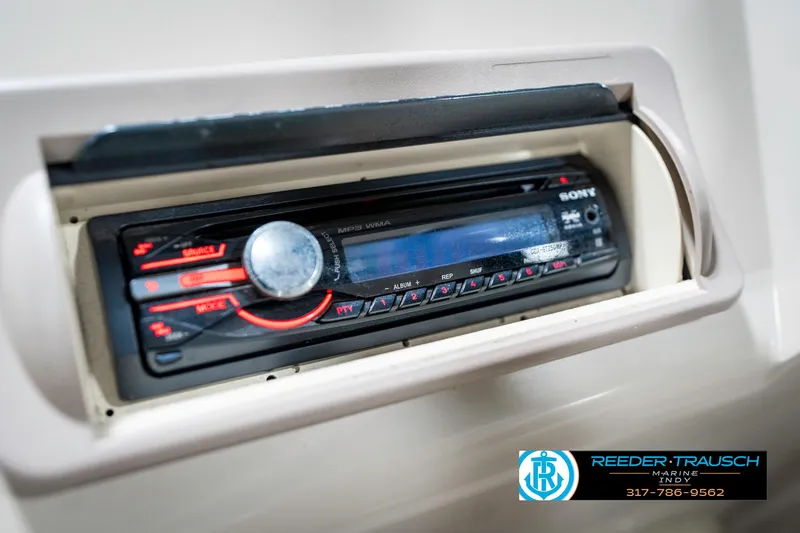 Slide: The Image of Sony stereo system in a 2011 Bennington 17 Sli boat dashboard. - 30
