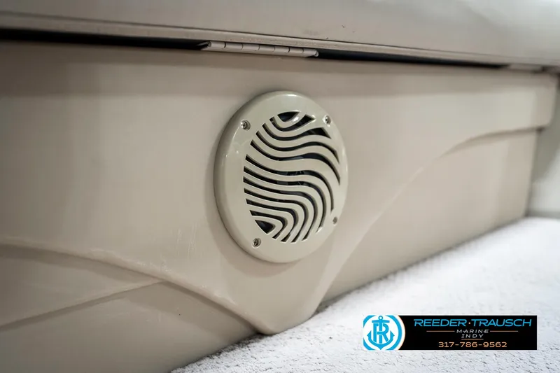 Slide: The Image of Speaker on a 2011 Bennington 17 Sli boat interior, featuring a stylish wave design. - 39
