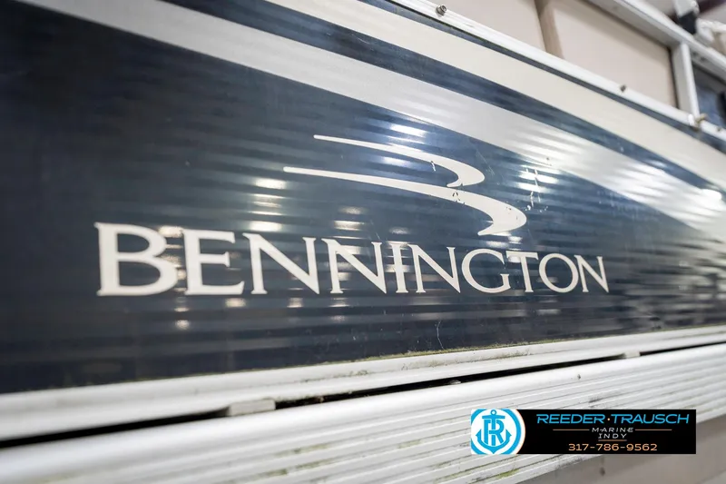 Slide: The Image of 2011 Bennington 17 Sli boat logo with Reeder-Trausch Marine contact details. - 43