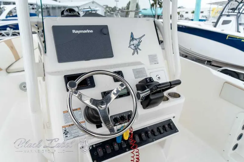 Slide: The Image of Steering console of a 2017 Century 2600 boat with Raymarine equipment. - 11