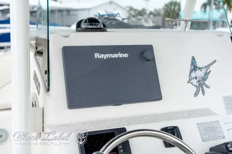 Slide: The Image of Control panel of a 2017 Century 2600 boat with Raymarine equipment. - 12