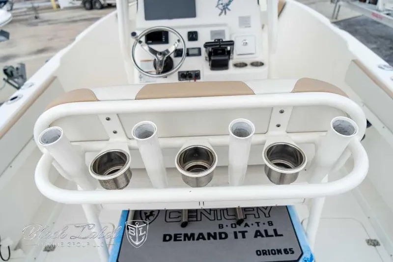 Slide: The Image of 2017 Century 2600 boat console with cup holders and steering wheel. - 19