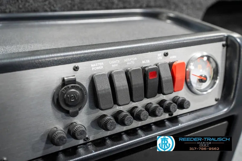 Slide: The Image of Control panel of 2025 Lund 1775 Pro Guide boat with switches and gauge. - 30