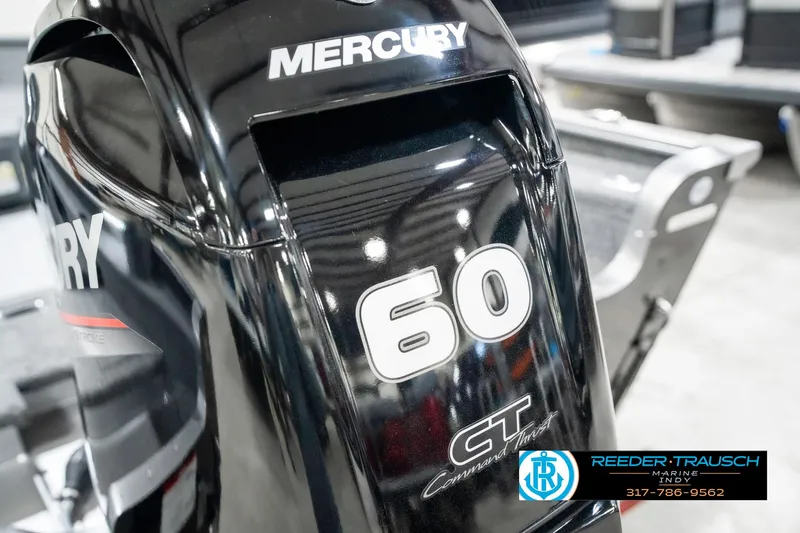 Slide: The Image of 2025 Lund 1775 Pro Guide with Mercury 60 HP outboard engine, showcased by Reeder-Trausch Marine. - 44