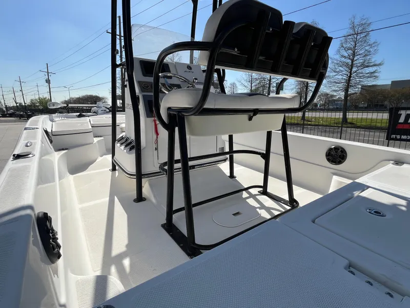 Slide: The Image of 2015 Epic 22 SC Center Console Bay Boat interior with seating and console view. - 13