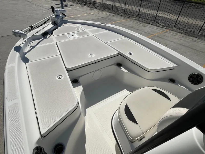 Slide: The Image of 2015 Epic 22 SC Center Console Bay Boat with spacious seating and storage compartments. - 16